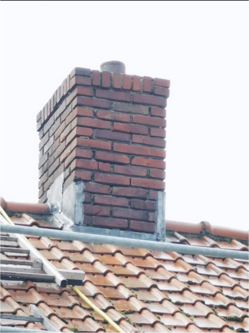 Na Schoorsteenrenovatie Breda - Schoorsteenrenovatie — volledig hersteld metsel- en voegwerk Breda